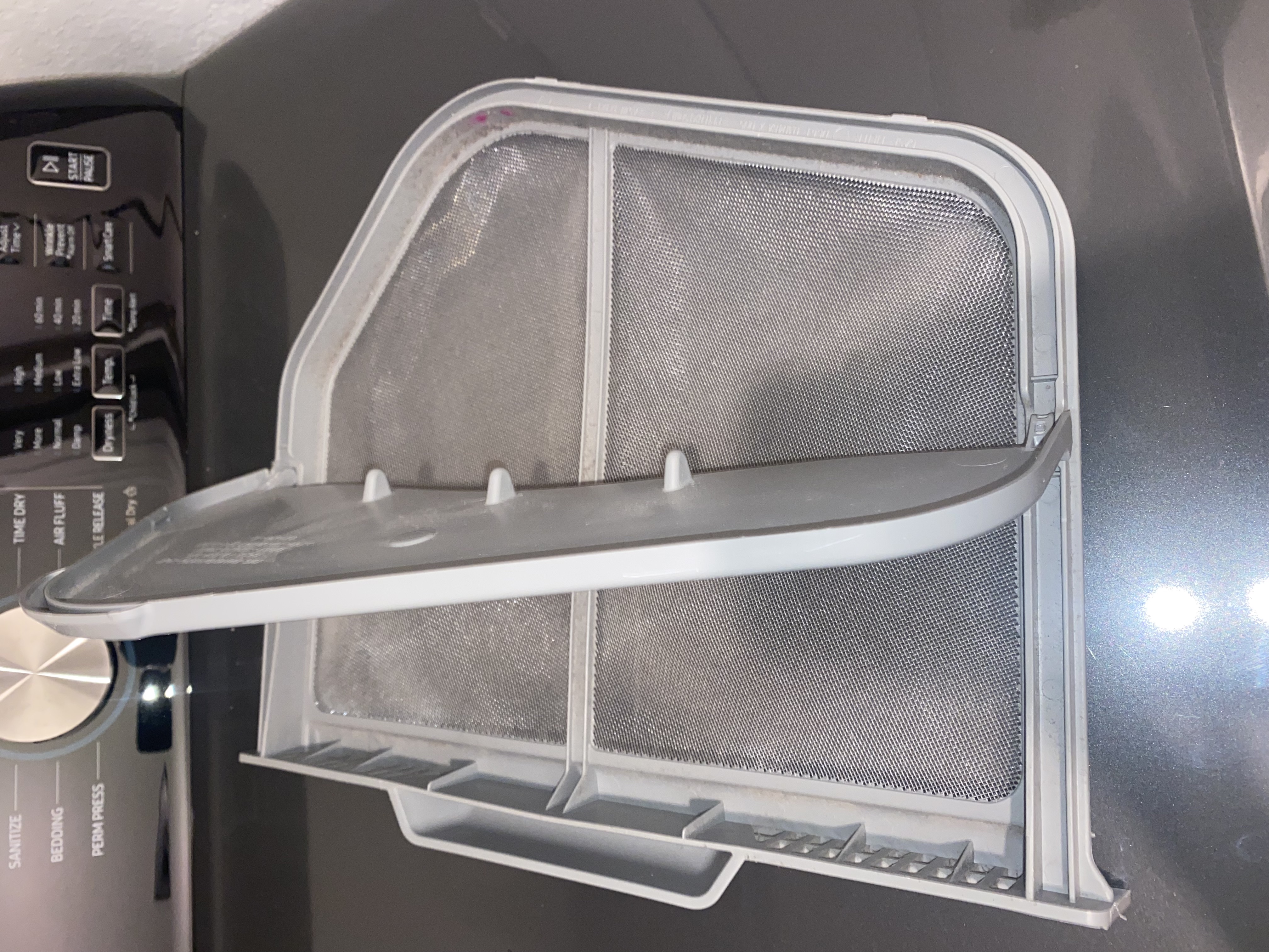 Freshly cleaned dryer lint screen free of debris, North Naples, FL